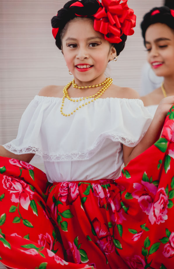 young girl in colorful dress
