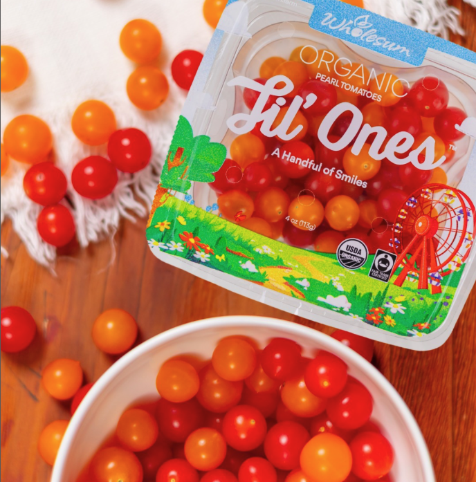 tiny snacking tomatoes on plate