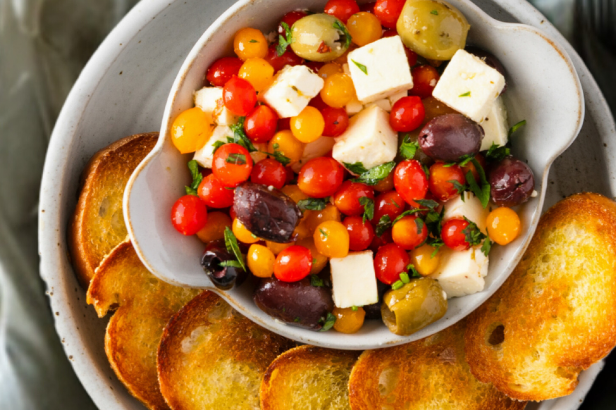Dish using small tomatoes and crostini